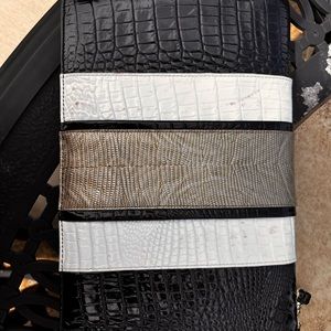 Brahmin clutch in black, white and gold with flaws